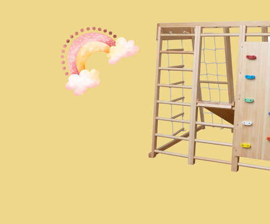 a wooden play structure with a ladder and a rainbow