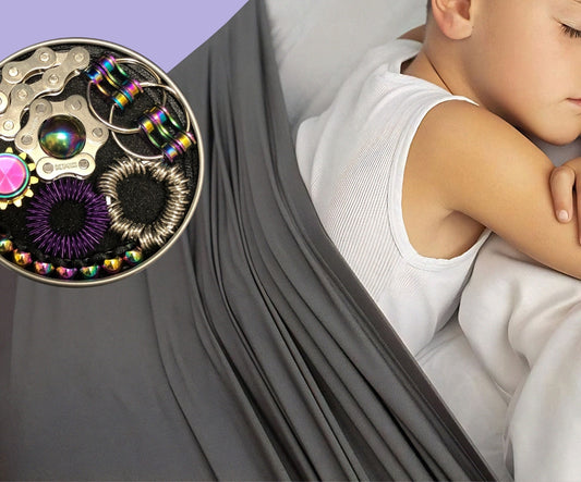 a child sleeping in a bed with a metal container with colorful objects